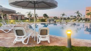 mini-villa situee dans une residence Prestigia à Marrakech, avec une vue sur la piscine et le golf une securite 24h sur 24 et une proximite ideale de l aeroport 5 minutes C est une offre parfaite pour des vacances - 7