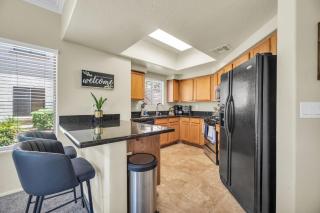 Comfy Condo with Heated Pool and Gym - 1