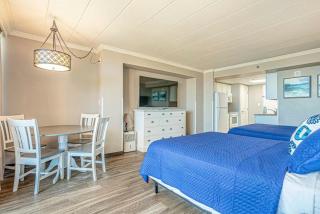 Great 1st floor unit that looks right out onto the beach with direct access - 8