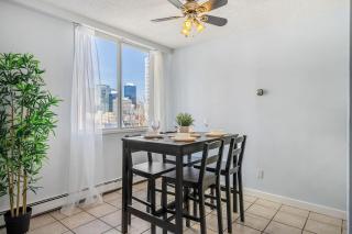 Prime Location Near Jasper Ave with Downtown Views, Netflix, Gym, Sauna, Sleeps 4 - 8