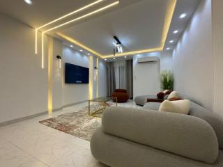 Luxurious 2-Bedroom Apartment in Primera Compound with Scenic Pool Views - Cairo - 0