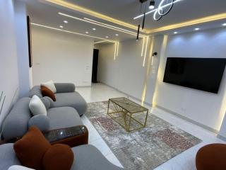 Luxurious 2-Bedroom Apartment in Primera Compound with Scenic Pool Views - Cairo - 6