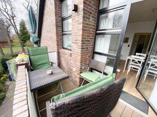 Ferien im Wangerland - Haus Wiesenweg - Ferienwohnung 1 1OG - Horumersiel - 1