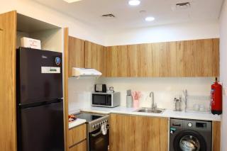 Warmcloud Relaxing 2BR Oasis Home in Masdar - Abu Dhabi - 8