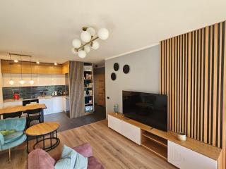 Apartament przy Loftach u Scheiblera parking podziemny, Śniadaniownia - 0