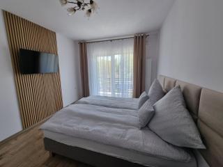 Pokoje Gościnne Wylotowa 32 - 4