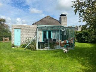 Noordzee omheind met hond - Dirkshorn - 0