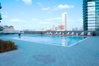 Luxury 1BR in JVC with Pool Gym & Fast WiFi at the Square Tower - 2
