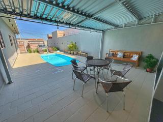 casa inteira com 3 suites e área de lazer - Delfinópolis - 9