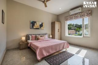 Arcadian Manor with Indoor Pool Indoor-Outdoor Games at Varanasi by StayVista - 3