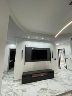 SUITE 102 - 7