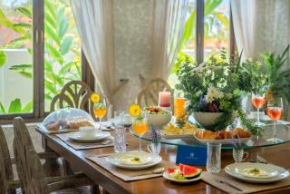 SaffronStays Sweet Mango - 4BR Goan villa with private pool, mango garden, bar gazebo & vibrant interiors near beaches - 5