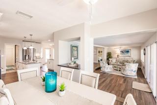 Spacious Waterfront Escape with Sun-Soaked Pool and Dock - 9