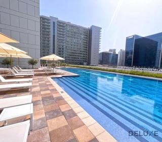 Charming 1BR Apartment in Vera Tower, Business Bay by Deluxe Holiday Homes - Dubai - 3