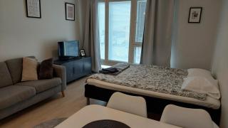 Very nice studio right next to the train station and free parking Kotimaailma Apartments - 9