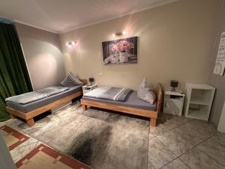 Palminas Ferienwohnung OG - 2