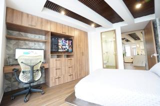 Luxury One Bedroom With Desk and Monitor - 1