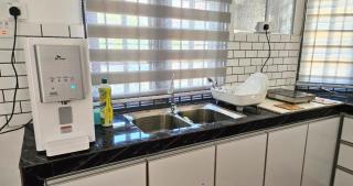 Beril Homestay Full Aircond, Free Wifi, Netflix, Water Filter - Paka - 3