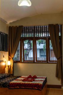 Sleepy Raccoon Hostel - Yogyakarta - 5
