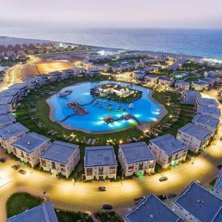Amwaj Prime Chalet with a Sea View شاليه أمواج الساحل الشمالي السعر شامل شحن الكهرباء و المياه و الأستعلام الأمني وغير شامل شحن كروت الإيجار - El-Alamein - 8