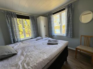 Majas Backe on a island with boat - 3