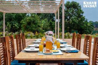 StayVista at Rio Vista with Pool, Lawn, Music Speaker & Game - 7