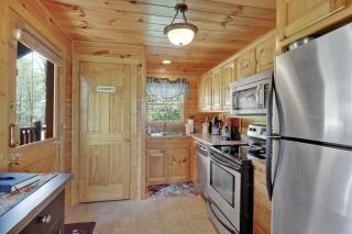 A Taste Of Honey is a dog-friendly two bedroom true log cabin nestled inside the Starr Crest resort - Sevierville - 2