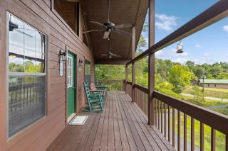 Pigeon Delight is a 2 Bedroom Cabin - 6 miles from Dollywood! Hot Tub, Fire Pit, Arcade, Pool Table! - 0