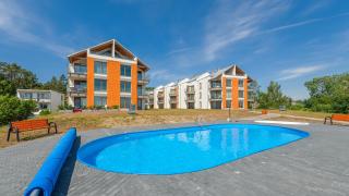 Apartamenty Sun & Snow Enklawa Krynica Morska - basen zewnętrzny sezonowy, sala zabaw, obok lasu - Krynica Morska - 9