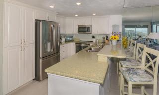 Ocean Condo 104 ~ Ground Floor Corner Condo with wrap around balcony Walk right out to Pool - New Smyrna Beach - 2