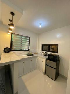 Roomiq B - Cozy 2BR APT with parking near SM Bataan - 9