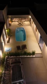 casa inteira com 3 suites e área de lazer - Delfinópolis - 0