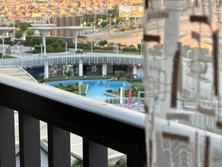 شقه فندقية ببورتو نيو كايرو بالتجمع الخامس307 - Cairo - 6
