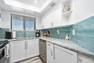 Ocean View Balcony just STEPS to the Beach with Pool, Parking and Wi-Fi! - 1