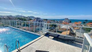 Passos da praia c/ piscina apto iluminado e novo - 9