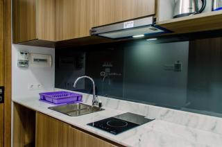 Elegant and Nice 1BR at The Smith Alam Sutera Apartment By Travelio - Tangerang - 8