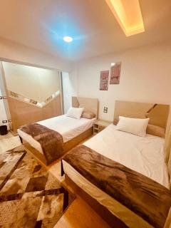 شقه بمنتجع هلنان بورفؤاد رقم 4 عماره1 Helnan Resd flat no4 Bld1 - - 7