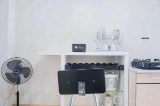 Nice and Spacious 2BR Green Pramuka City Apartment By Travelio - 8