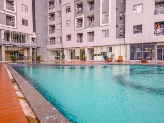 Wonderful and Homey 1BR Apartment Royal Olive Residence By Travelio - 5