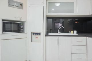 Comfy and Elegant 2BR at Sudirman Tower Condominium Apartment By Travelio - 9