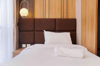 Stunning and Comfy 2BR + Study Room at Sudirman Suites Apartment By Travelio - 8