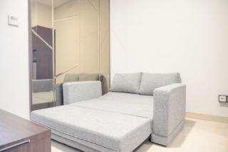 Elegant and Comfort 1BR Sudirman Suites Apartment By Travelio - 9