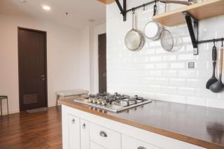 Nice and Homey 1BR at Citralake Suites Apartment By Travelio - 2