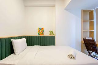 Warm and Minimalist Studio Tokyo Riverside PIK 2 Apartment By Travelio - Rawalembang - 4