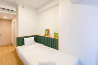 Warm and Minimalist Studio Tokyo Riverside PIK 2 Apartment By Travelio - Rawalembang - 0