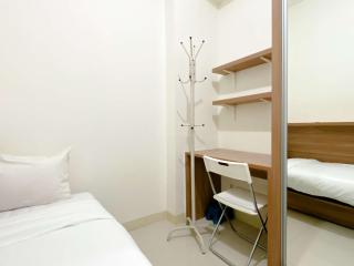 Comfort Designed 2BR Green Pramuka City Apartment By Travelio - 5