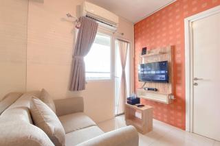 Cozy Living 2BR Green Pramuka City Apartment near Mall By Travelio - 3