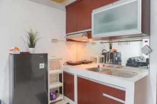 Modern Look 2BR Apartment at Springhill Terrace Residence By Travelio - 5