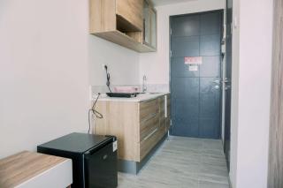 Homey and Comfort Living Studio Collins Boulevard Apartment By Travelio - 6