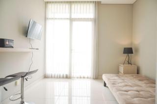 Homey and Warm 1BR at Ciputra International Apartment By Travelio - 2